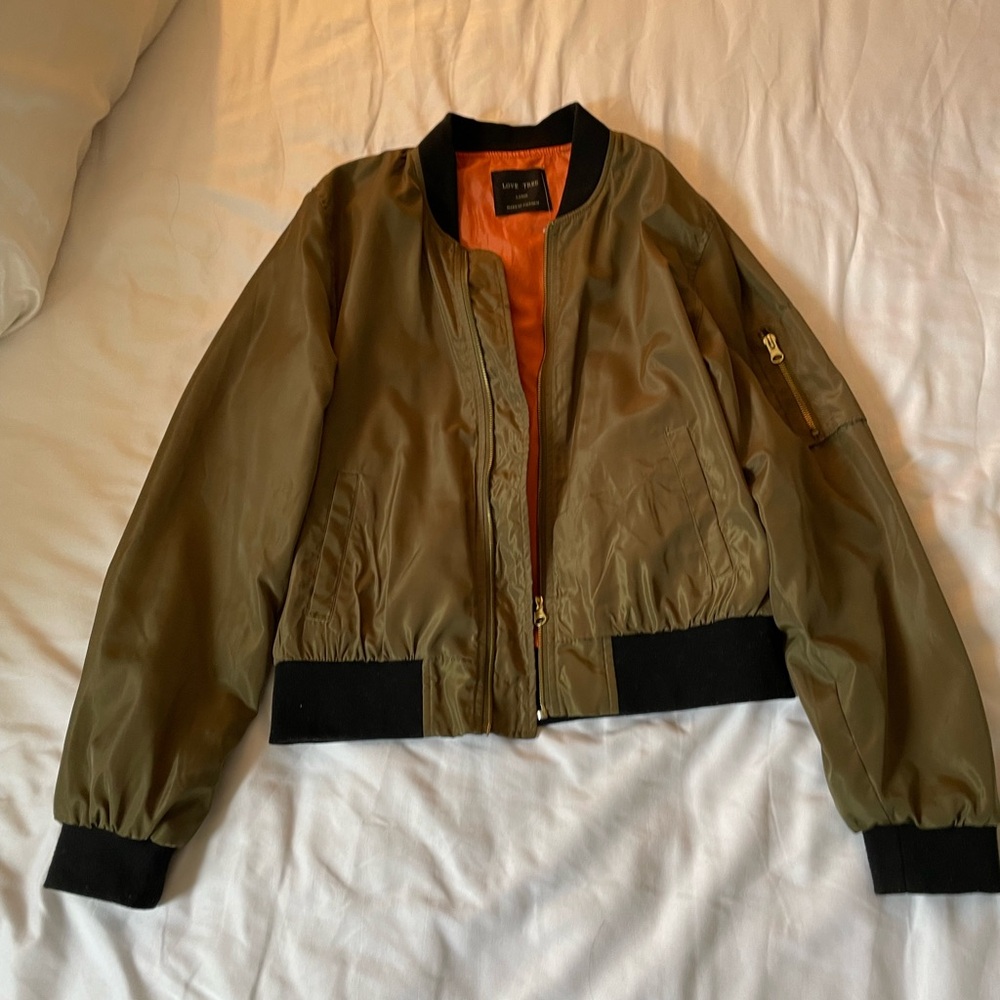 Khaki and black bomber jacket with orange lining #bomberjacket

Size large